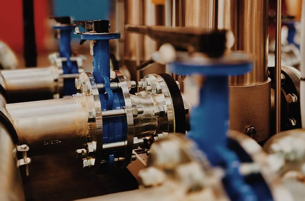 Pumps and valves in an industrial pump room